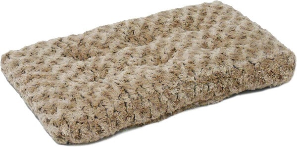 A cozy dog bed with a gradient swirl pattern.