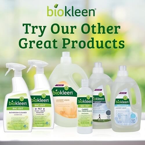 Bottle of Biokleen Bac-Out Enzyme Stain & Odor Remover surrounded by fresh flowers and clean surfaces