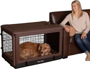 Pet Gear's 'The Other Door' steel crate featuring four doors including a garage-style side door, complete with a plush bed and a travel bag, available in three models and colors.