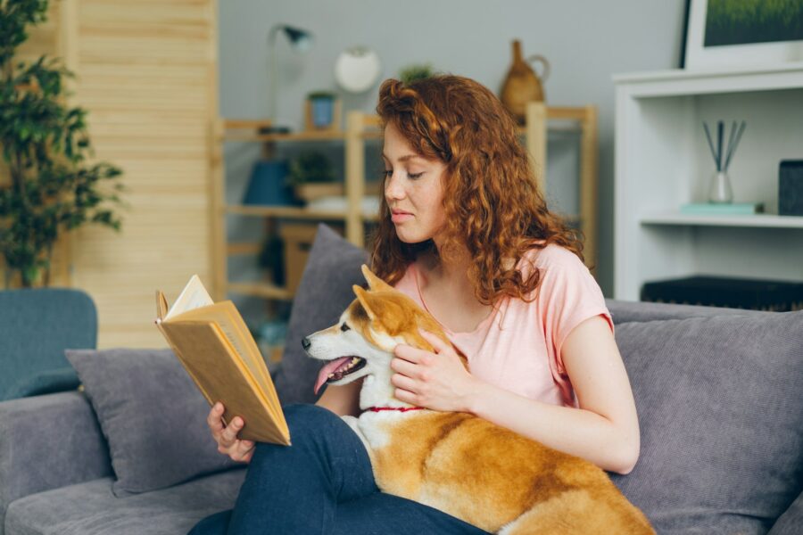 Dog owner relaxing